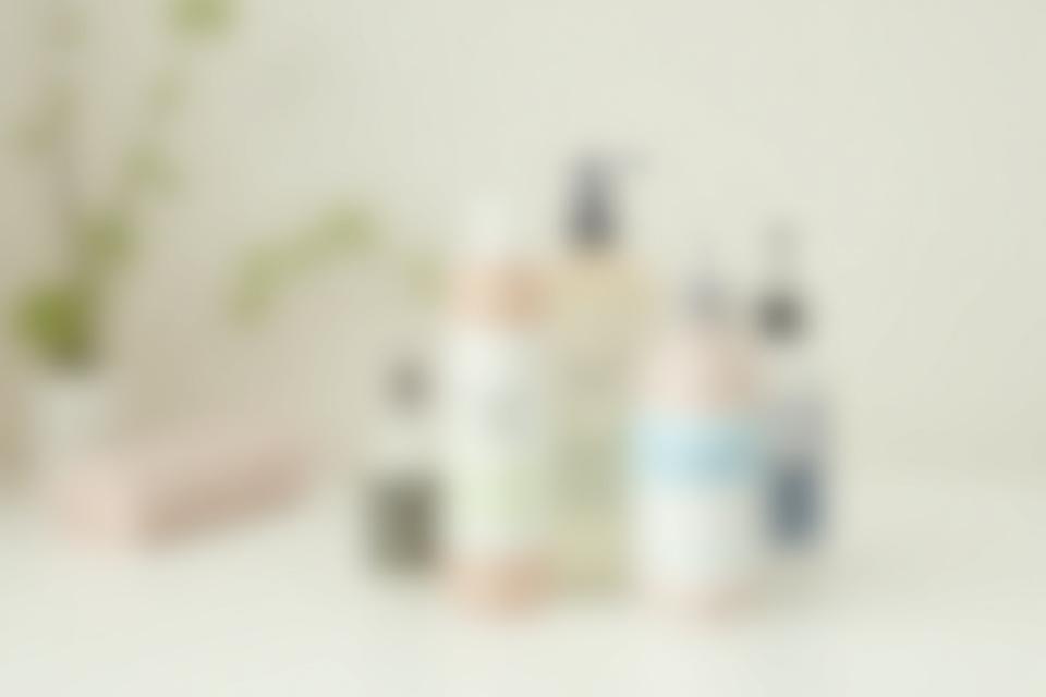 Various pet shampoos lined up, one labeled 'sensitive skin'